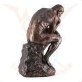 The Thinker by Auguste