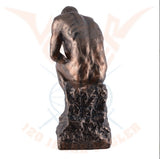 The Thinker by Auguste
